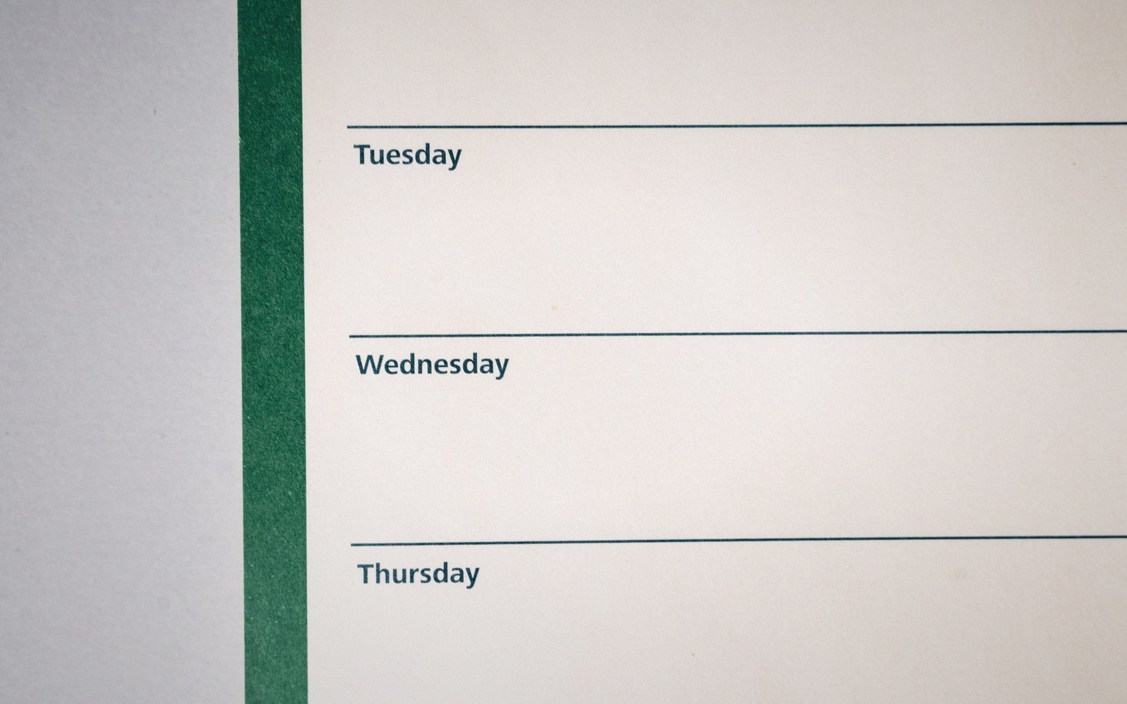Blank weekly planner page showing empty rows for Tuesday, Wednesday, and Thursday